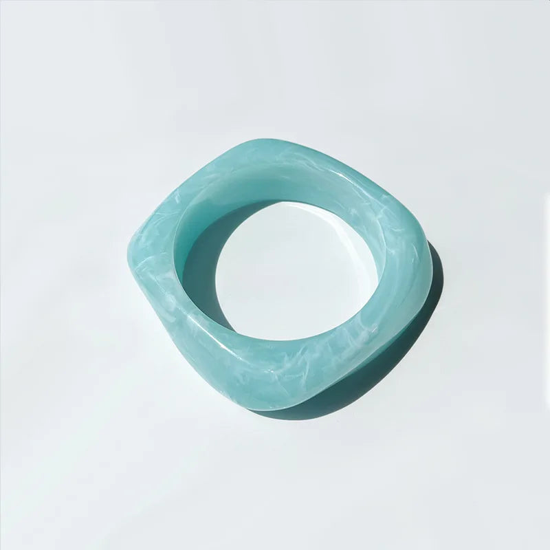 Turquoise bangle on a white background