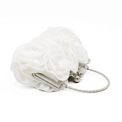 White floral clutch bag with silver chain on a white background