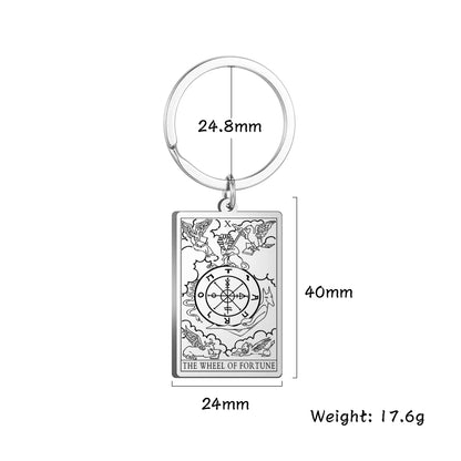 Keychain with 'The Wheel of Fortune' design and measurements on a white background
