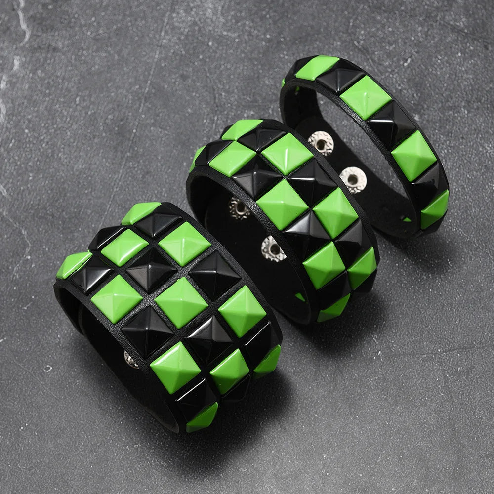 Black and green checkered bracelets on a dark grey background