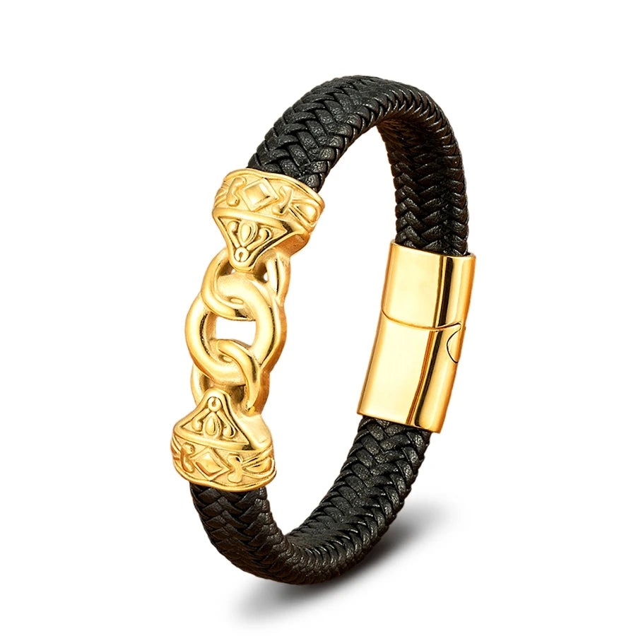 Black braided bracelet with gold clasp and decorative elements on a white background