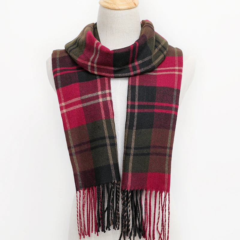 Plaid scarf with fringes on a mannequin against a white background