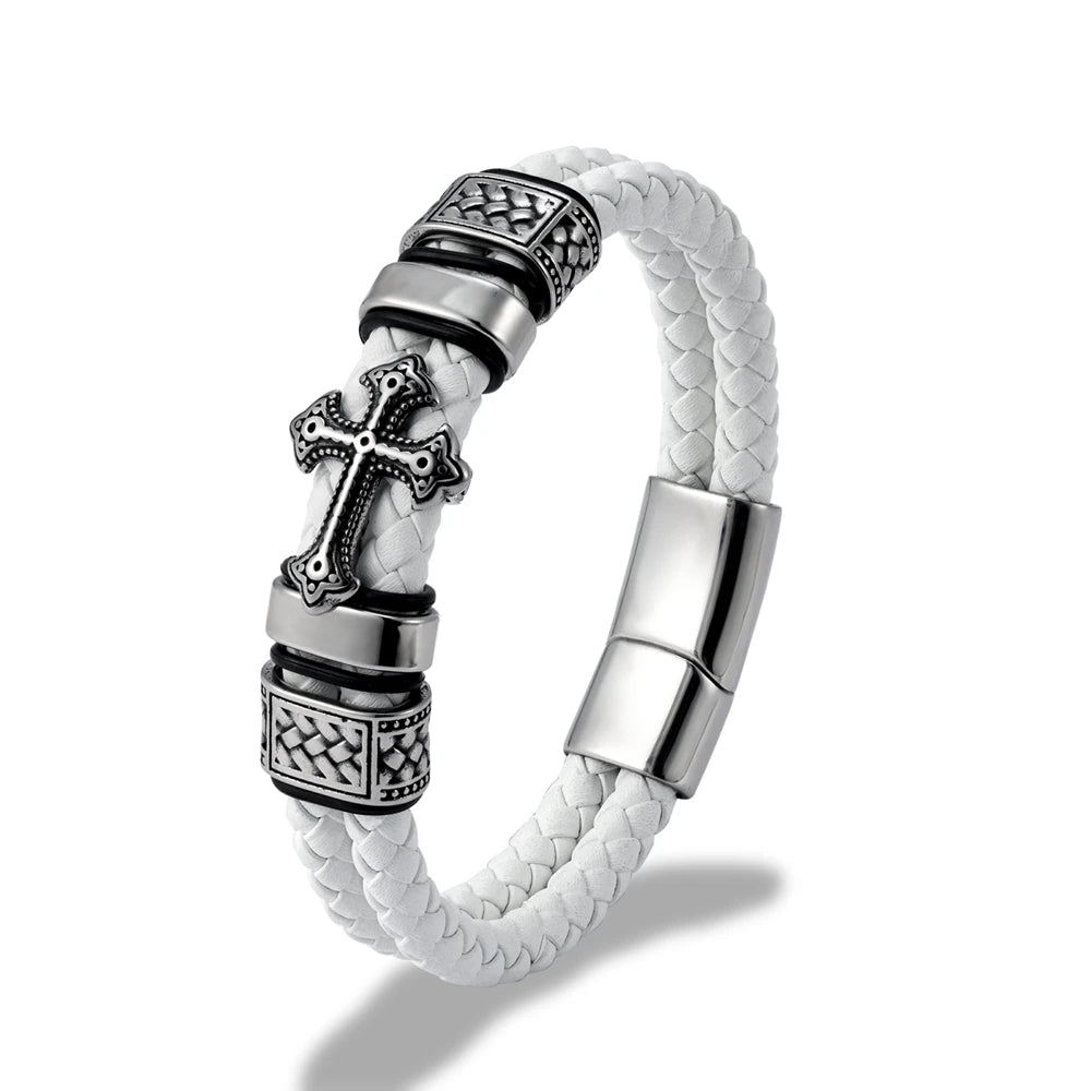 A white braided leather bracelet with a silver-toned metal cross charm and decorative textured beads, shown on a clean white background.