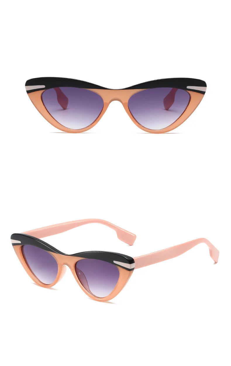 Cat-eye sunglasses with black and pink frame on a white background