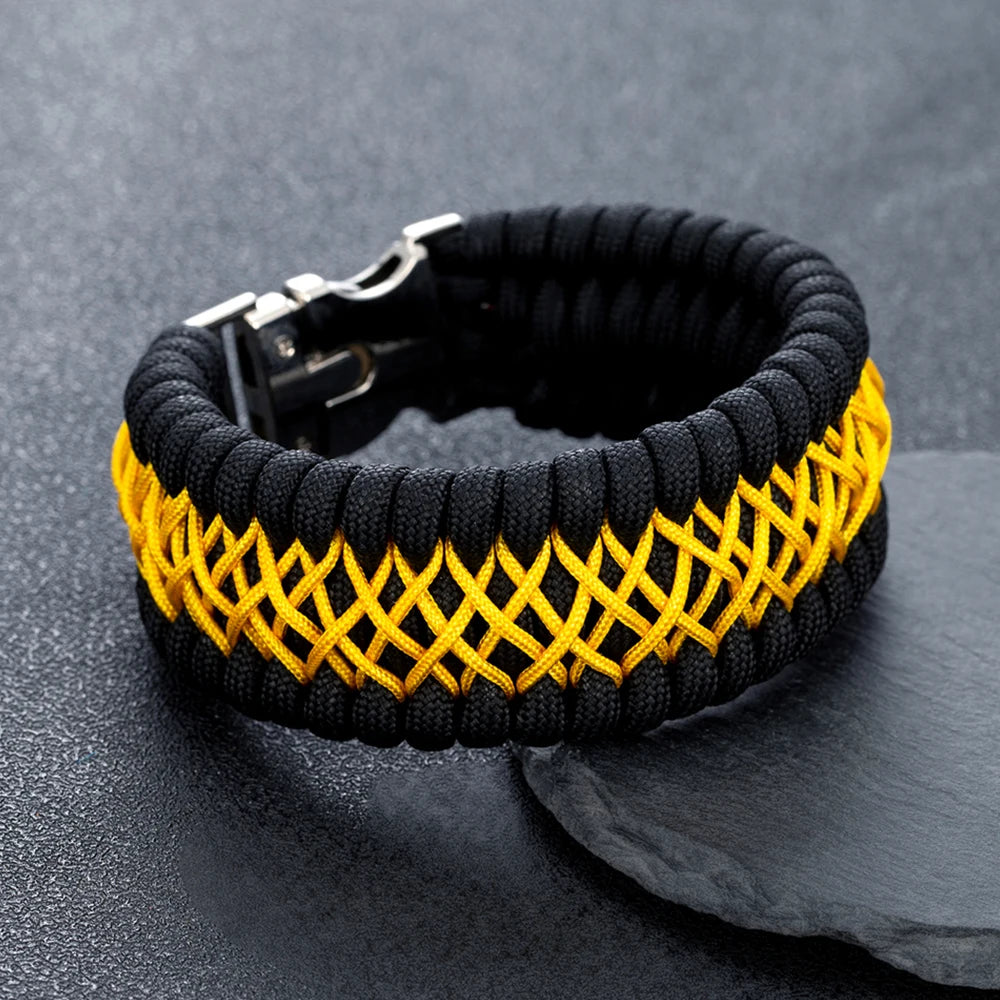 Black and yellow braided bracelet on a dark grey background
