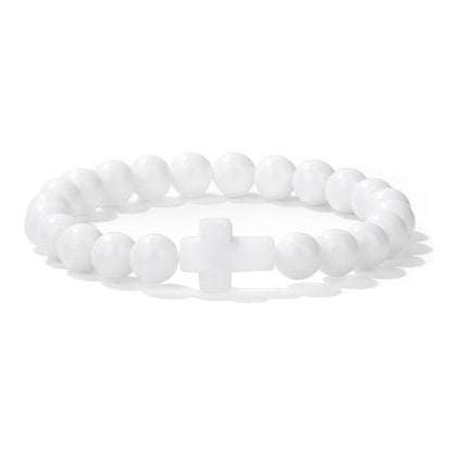 White beaded bracelet with a cross charm on a white background