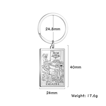 Keychain with Tarot card design labeled 'Death' and measurements on a white background