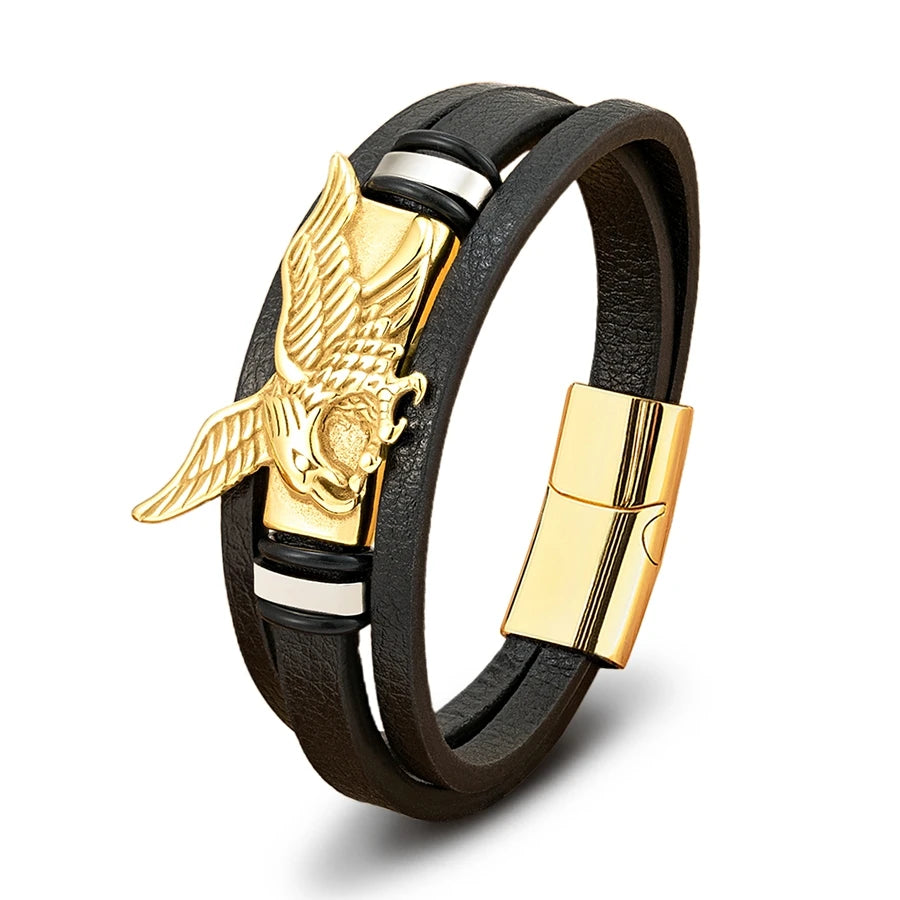 Black leather bracelet with gold eagle emblem on a white background