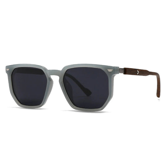 Sunglasses with grey frame and dark lenses on a white background
