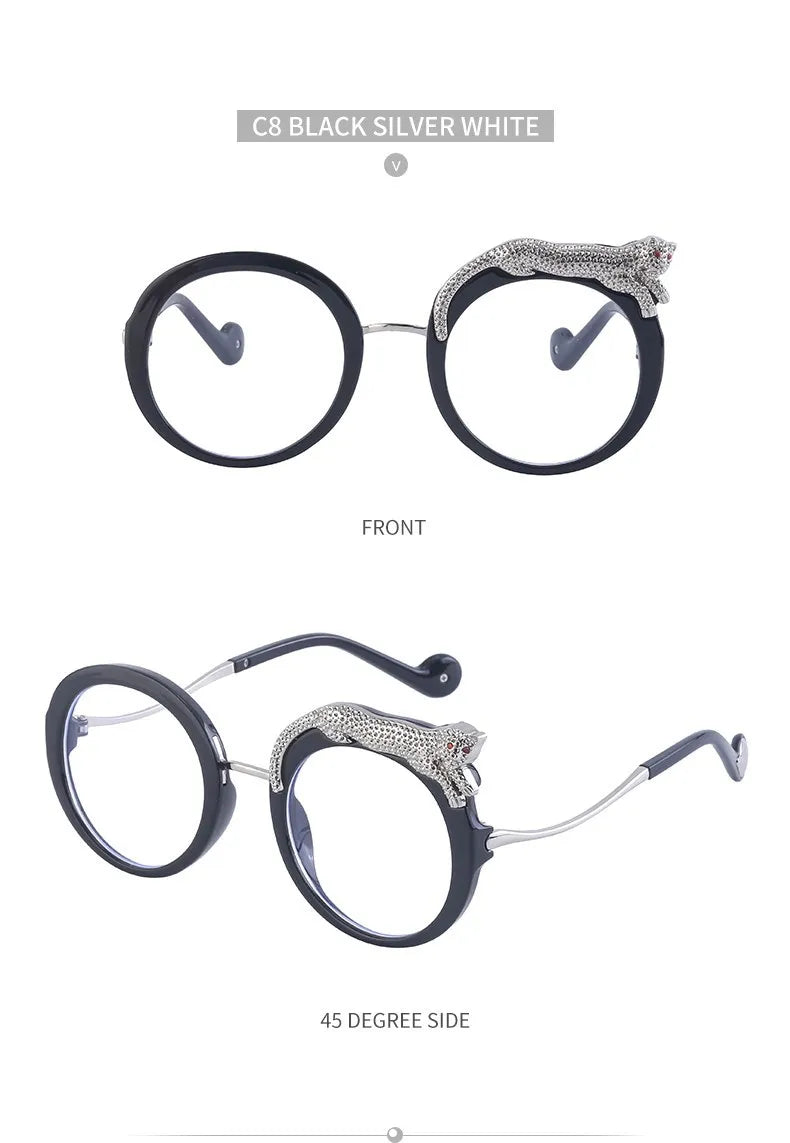 Round eyeglasses with decorative arm ends on a white background
