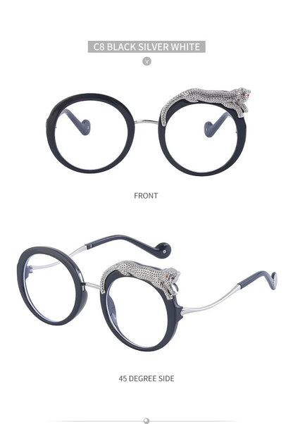 Round eyeglasses with decorative arm ends on a white background