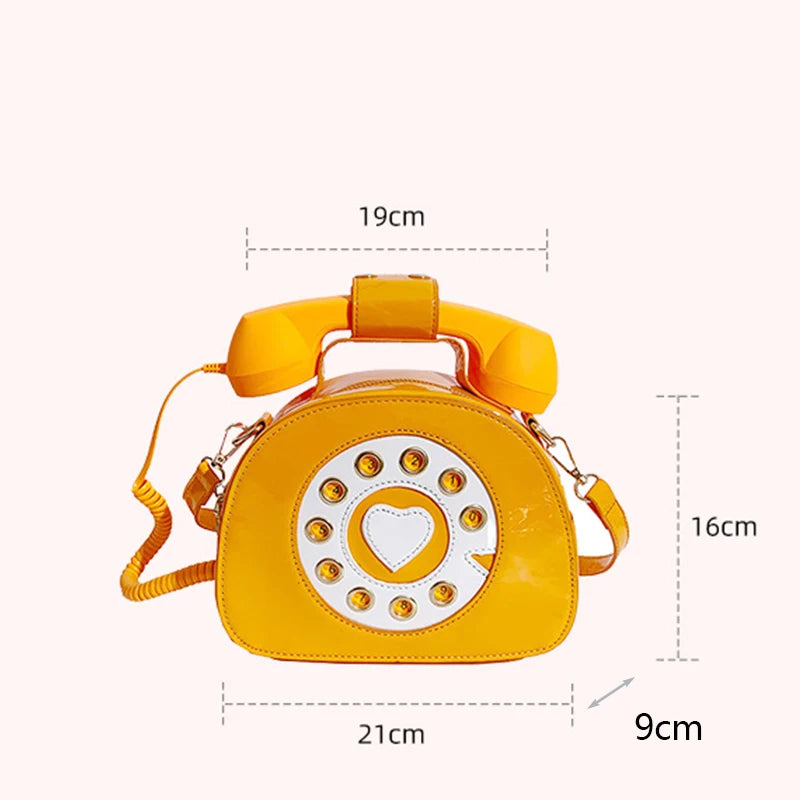 Orange phone-shaped handbag with measurements on a white background