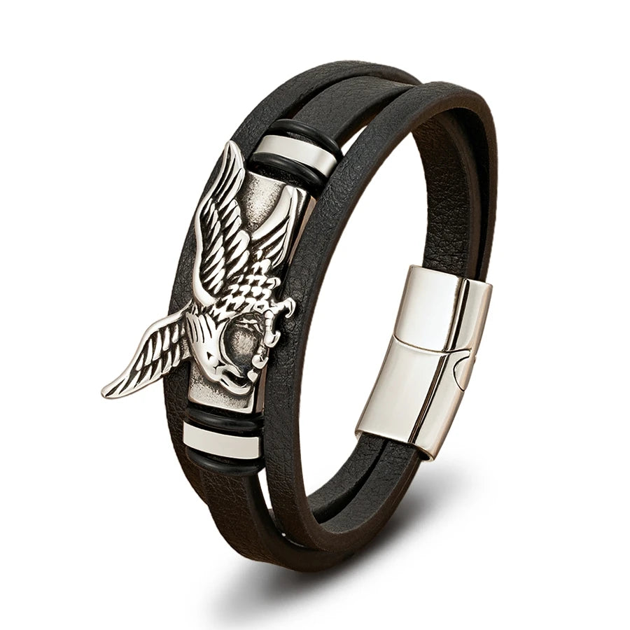 Black leather bracelet with silver eagle emblem and clasp on a white background
