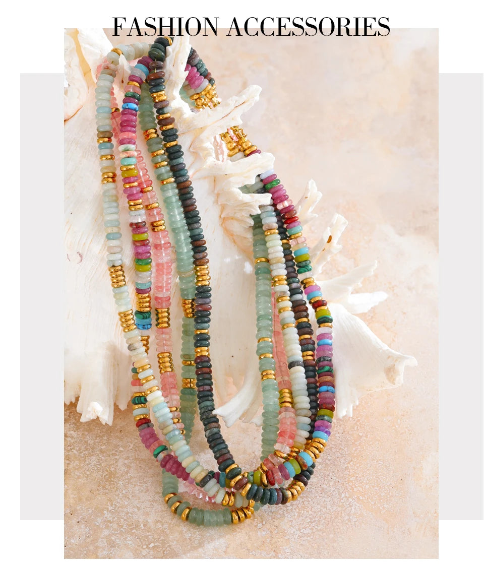 Colourful beaded necklaces on a textured surface 