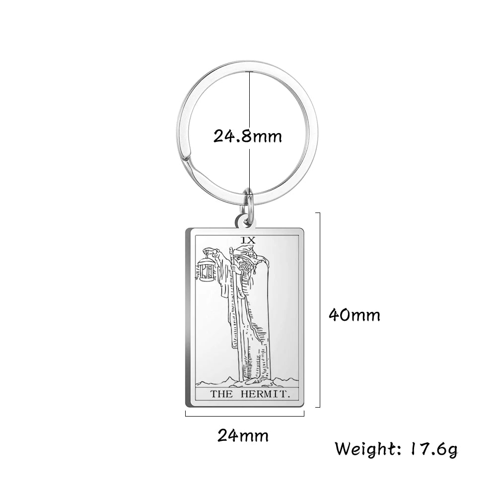 Keychain with tarot card design, showing measurements and weight on a white background