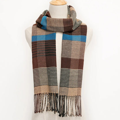 Plaid scarf with brown, blue, and beige colours on a mannequin against a white background