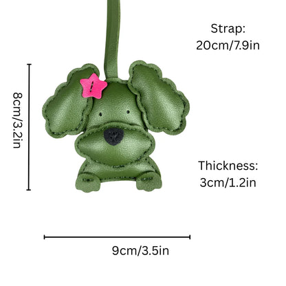 Green dog-shaped keychain with measurements on a white background
