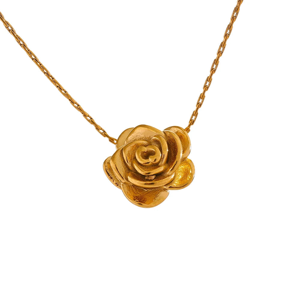 Gold rose-shaped pendant on a chain on white background