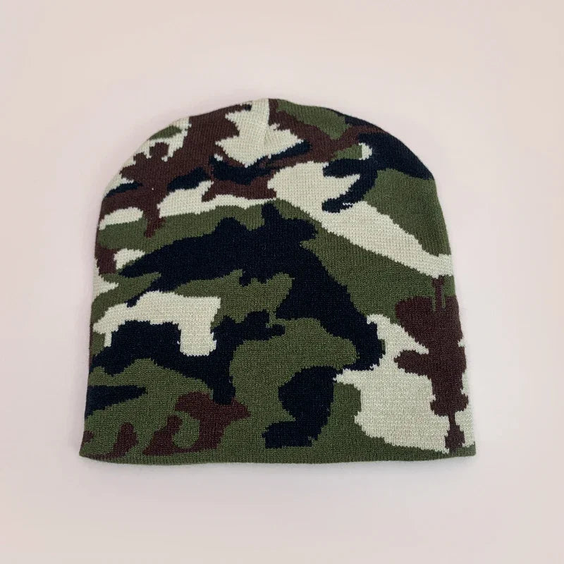Camouflage patterned beanie on a light beige background