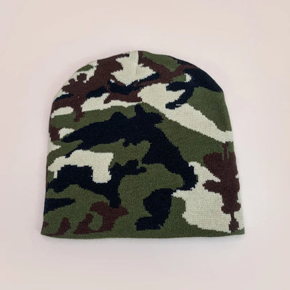Camouflage patterned beanie on a light beige background