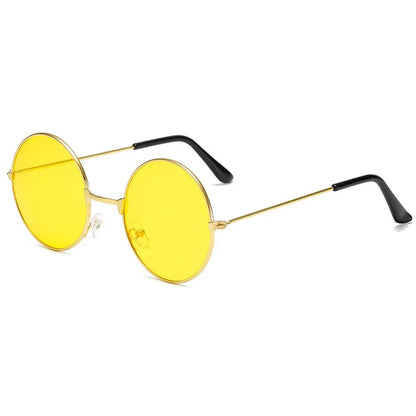 Yellow round sunglasses with gold frames and black arms on a white background
