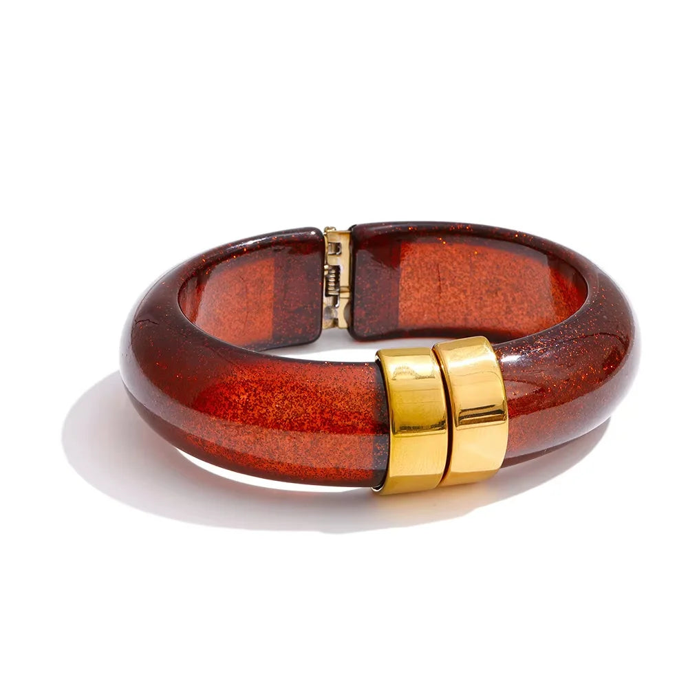 Wooden Brown bracelet with gold accents on a white background
