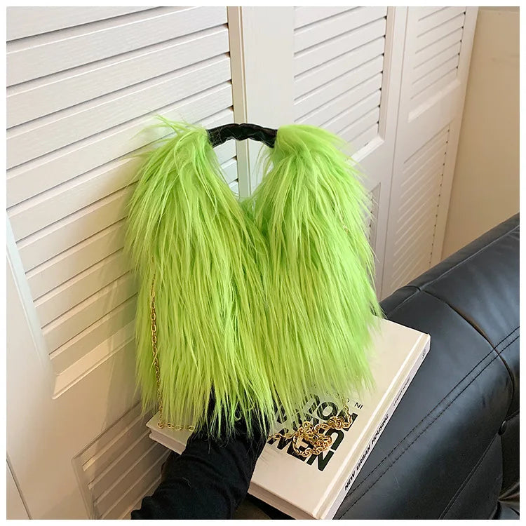 Neon green furry bag on a hanger against a white shutter background