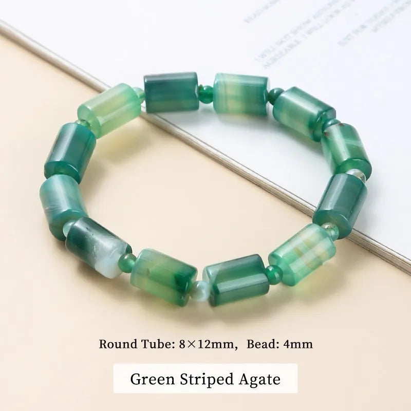 Green striped agate bracelet on a light background