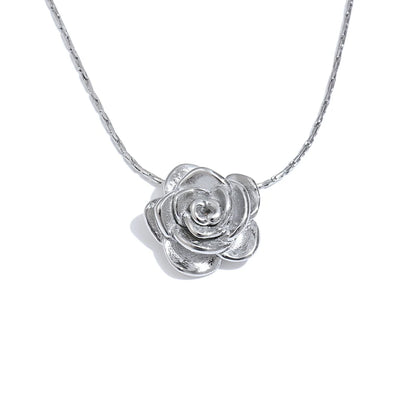 Silver rose-shaped pendant on a chain against a white background