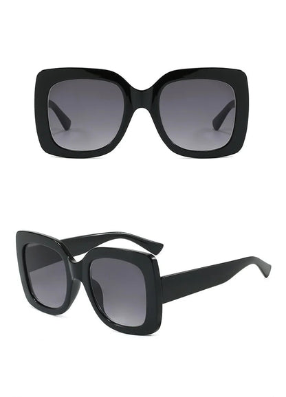 Black oversized square sunglasses with gradient grey lenses, shown from front and side angles on a white background with text labels.
