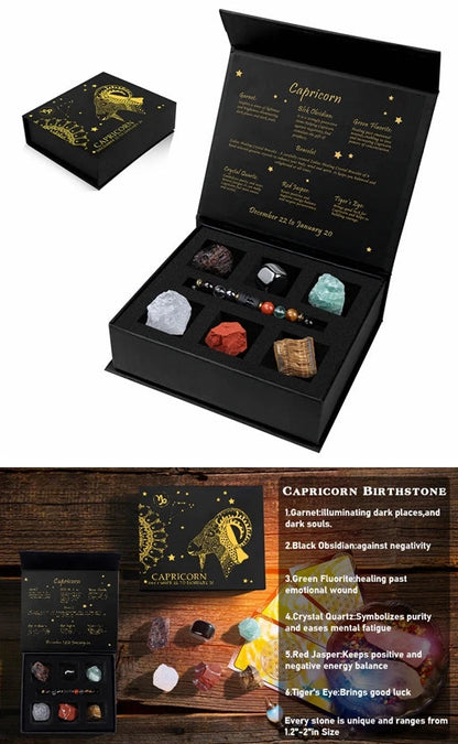 Crystal set with packaging, stones, and jewelry on a dark background