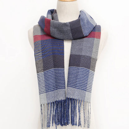 Plaid scarf with blue, red, and grey colours on a mannequin against a white background