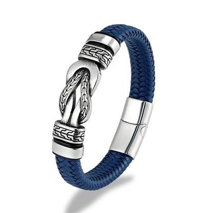 Blue braided bracelet with silver metal clasp on a white background