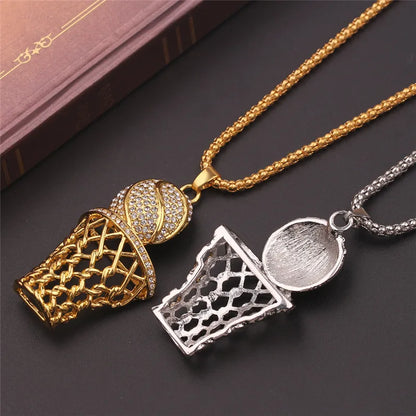 Two basketball-themed pendants on chains against a dark background