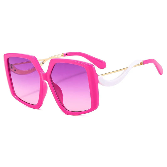 Pink sunglasses with a gradient lens on a white background