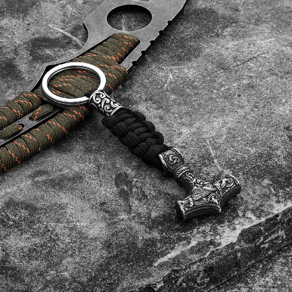 Keychain with hammer design on a textured surface