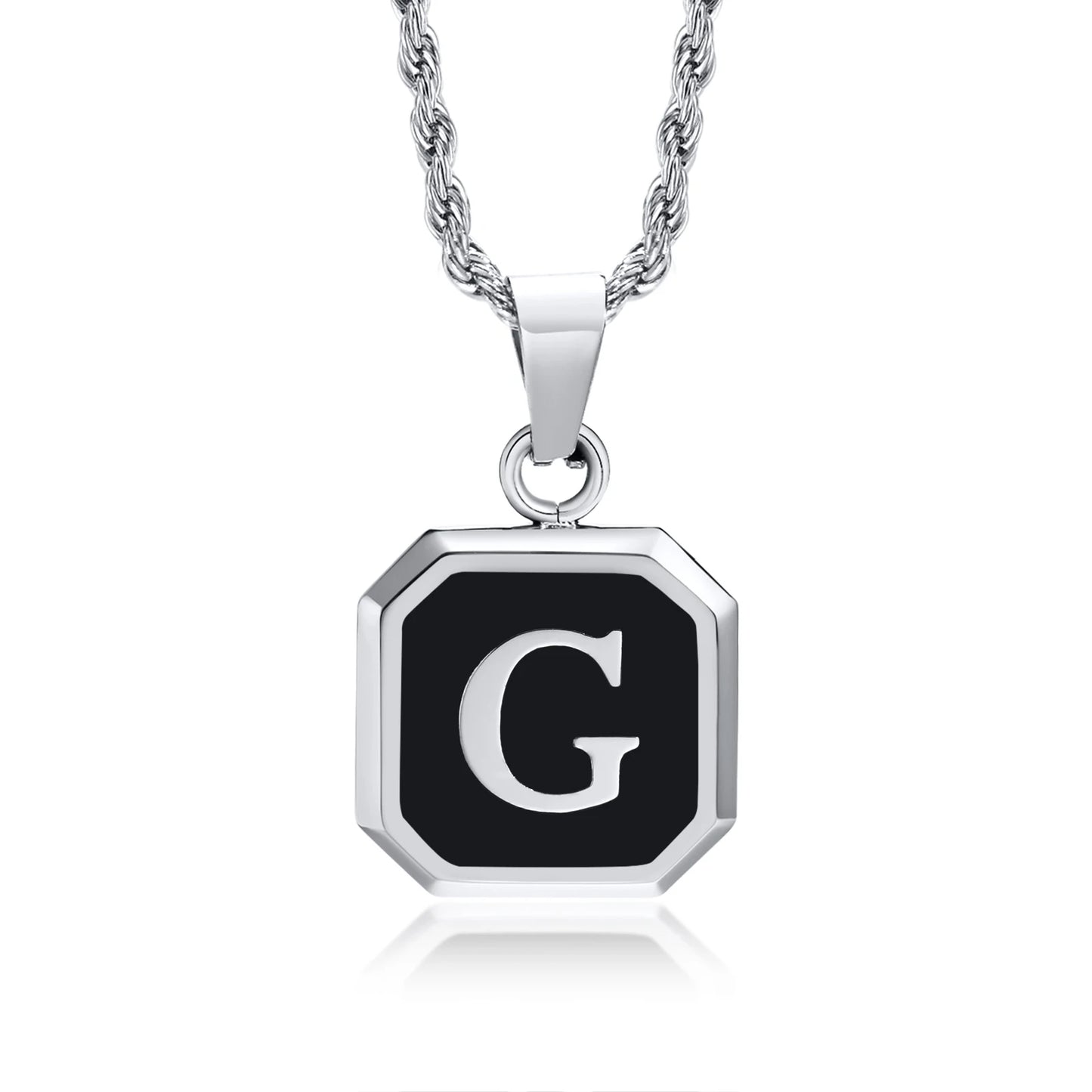 Silver necklace with a black pendant featuring the letter 'G' on a white background