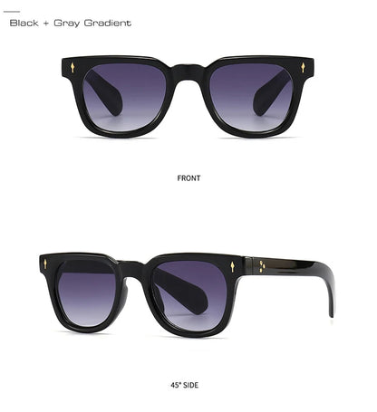 Black sunglasses with grey gradient lenses on a white background