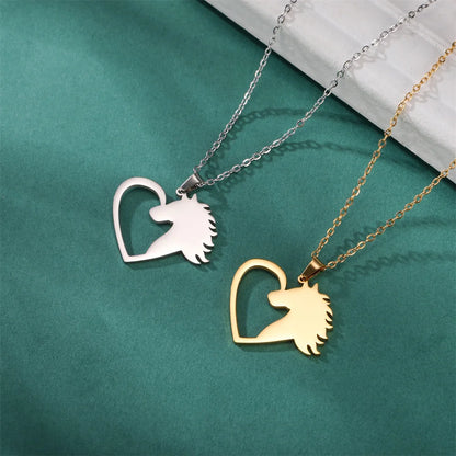 Two necklaces with heart-shaped pendants featuring animal silhouettes on a teal background.