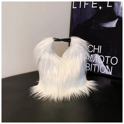 White feathered shoulder bag on a dark surface with a blurred background