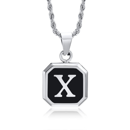 Necklace with a pendant featuring the letter 'X' on a white background