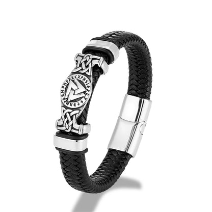 Black braided leather bracelet with silver clasp and Celtic knot design on a white background
