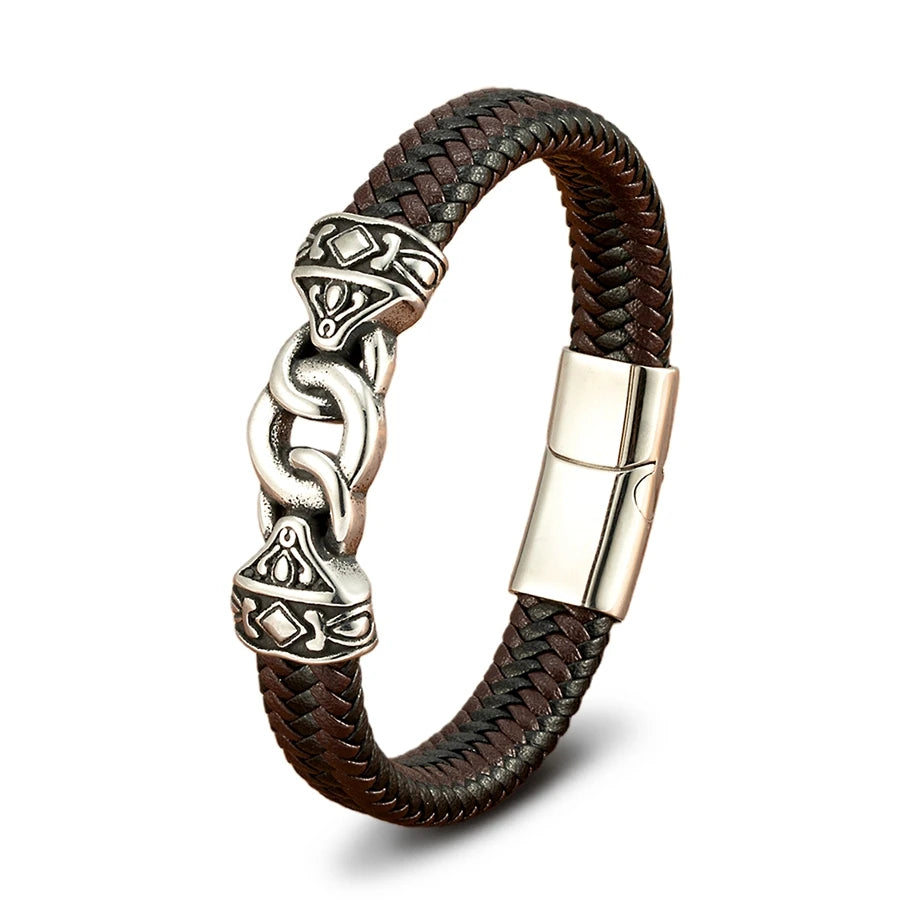 Brown braided leather bracelet with silver Celtic knot design on a white background