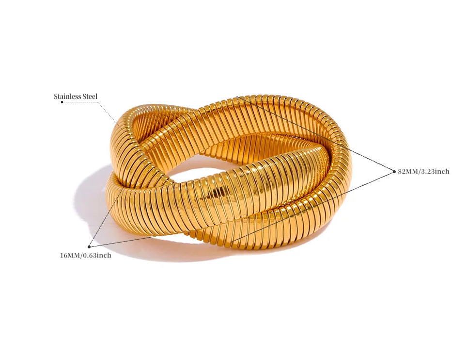 Gold bracelet with measurements on a white background