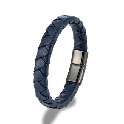 Navy blue braided pattern leather bracelet with black metal clasp on white background