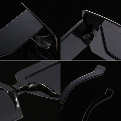 Close-up of a black sunglasses with a dark background