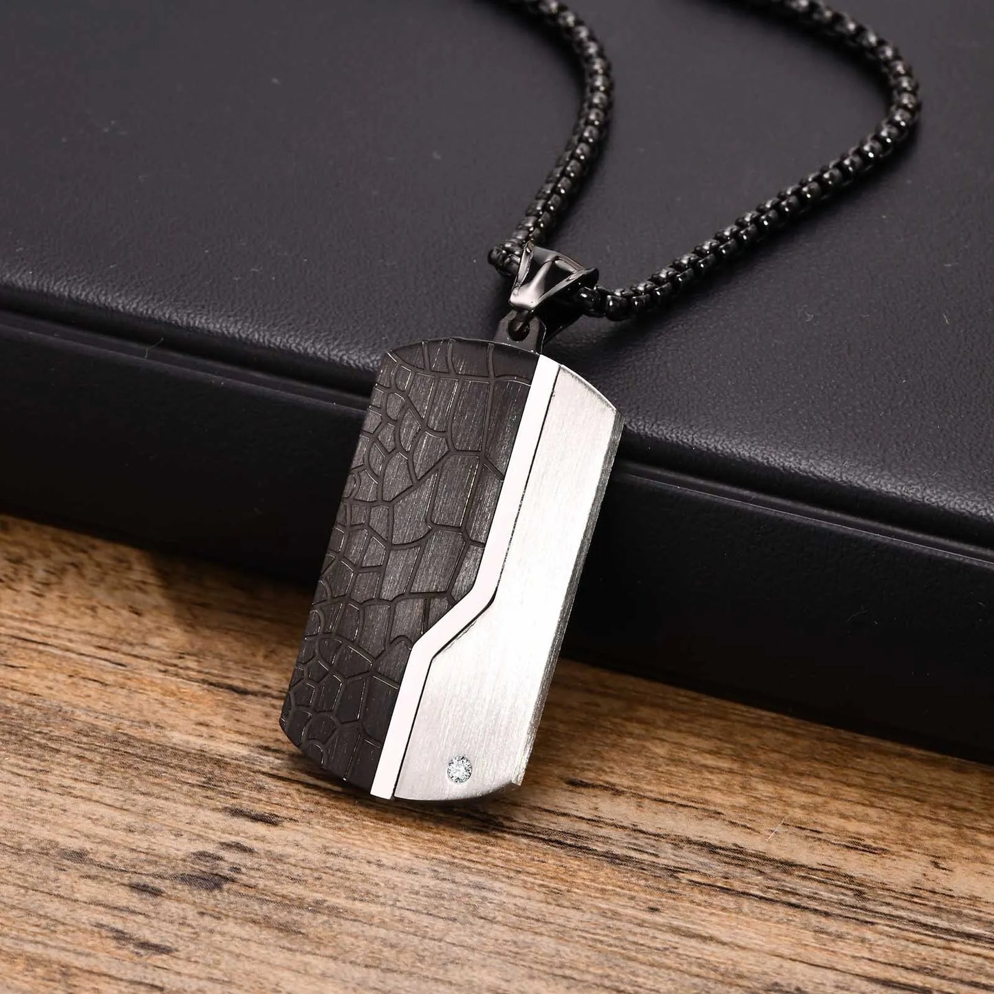 Necklace with a unique pendant on a wooden surface