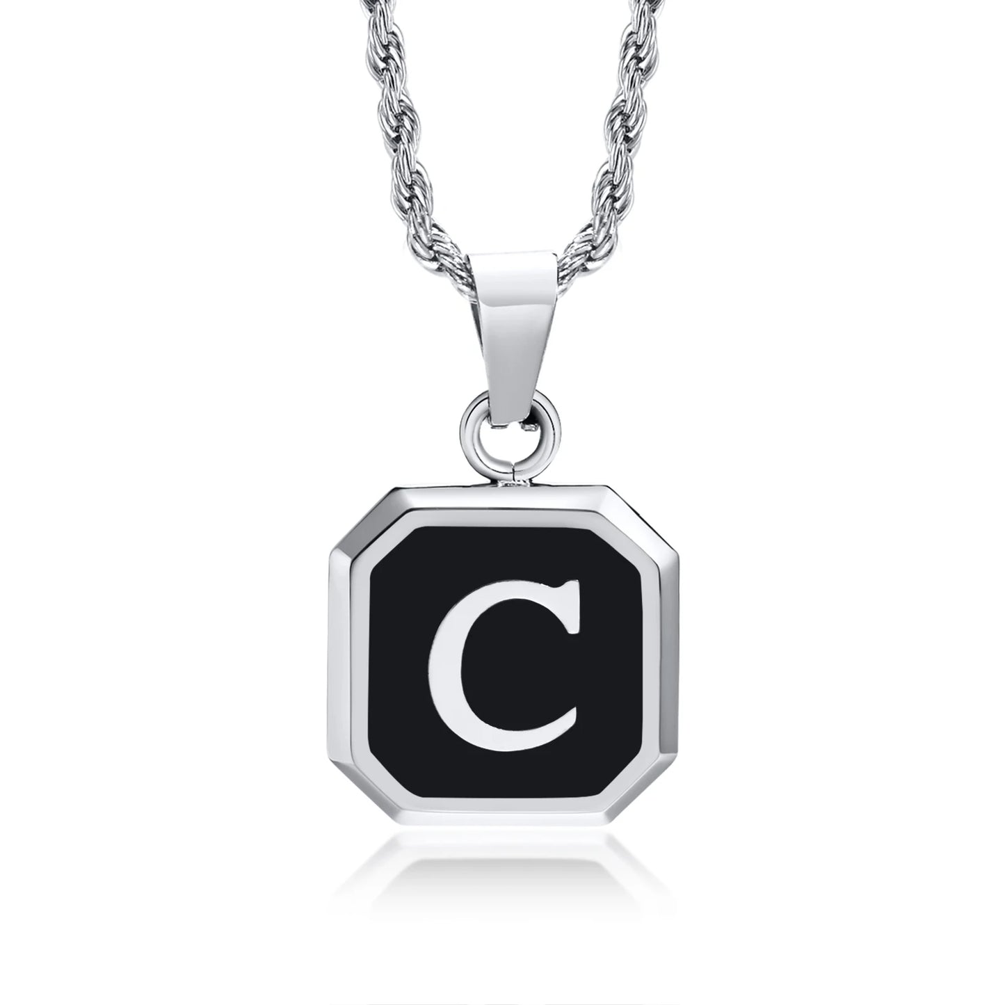 Silver necklace with a black octagonal pendant featuring the letter 'C' on a white background