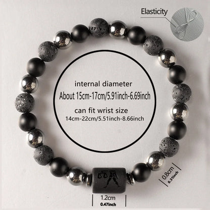 Black beaded bracelet with measurements on a light grey background