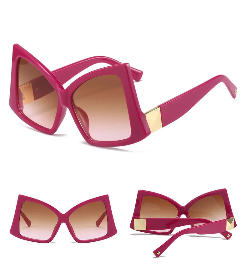Sunglasses with pink frame and gold accents on a white background